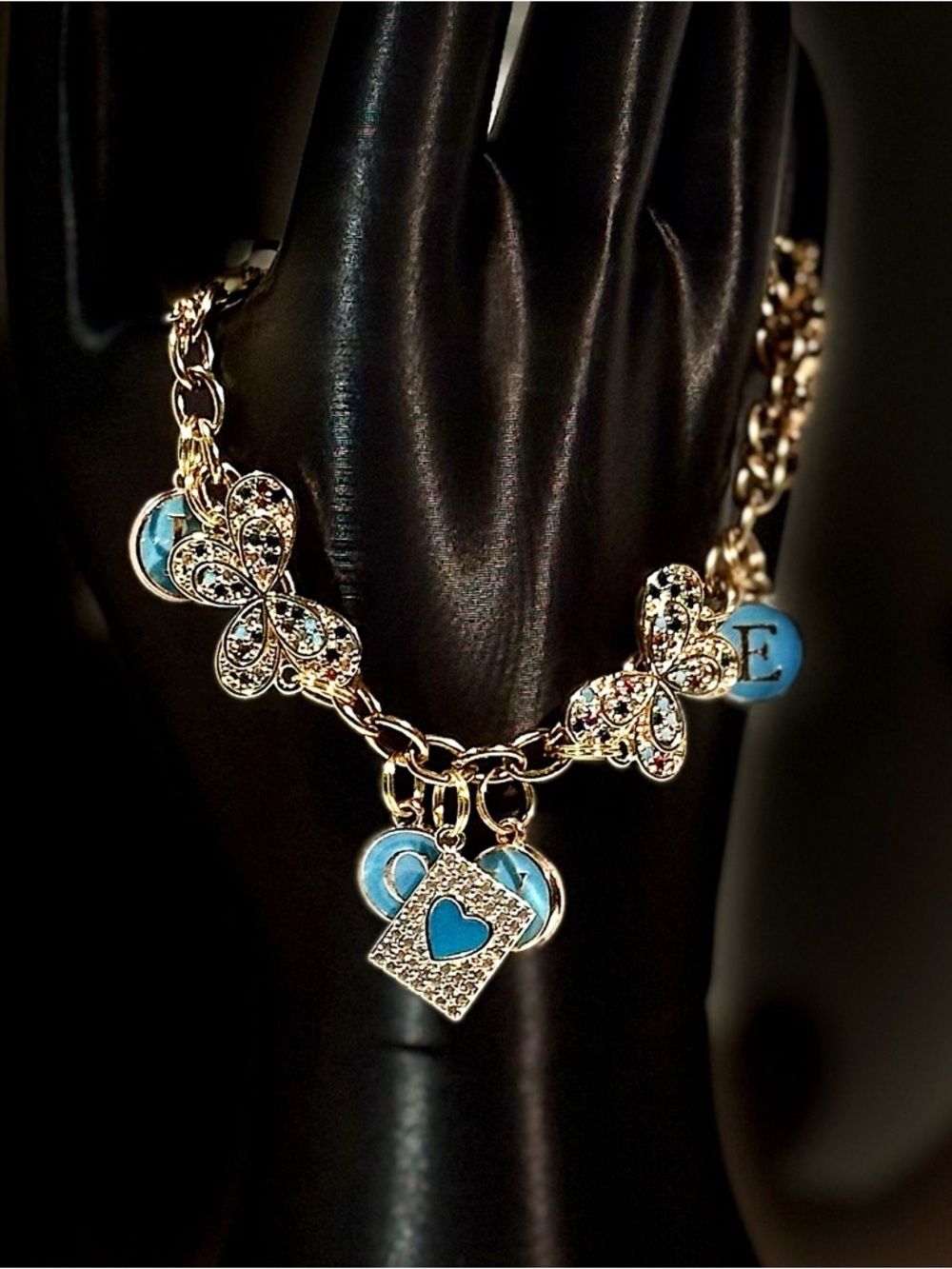 Gold Butterfly and Snake Charm Bracelet